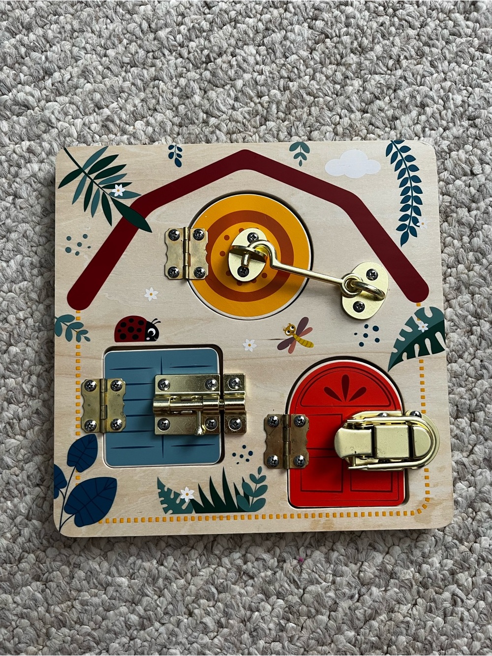 Children's Wooden Busy Board with Red and Blue Accents